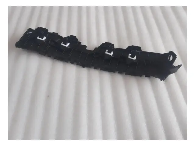 Rear bumper · 后保险杠左前支架总成