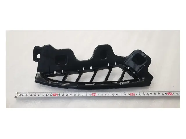 Front bumper · 前保左装饰件